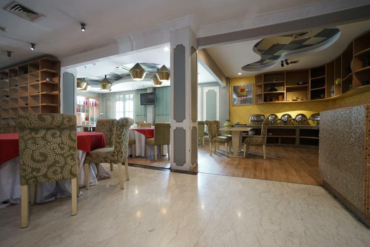 Capital O 1128 Hotel Imara 팔렘방 외부 사진